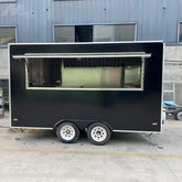 Sleek Black Enclosed Food Trailer - Dual Axle Commercial Kitchen