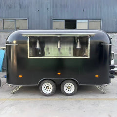 Sleek Black Capsule Food Trailer - Dual Axle Commercial Kitchen
