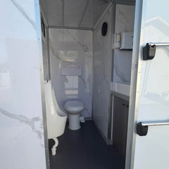 Modern Marble 2-Station Portable Restroom Trailer - Elegant Mobile Bathroom