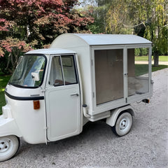 Vintage Cream Three-Wheeled Food Cart with Transparent Display Section