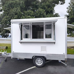 9.8ft White Enclosed Food Trailer for Mobile Catering with Single Axle & Diamond Plate Skirt