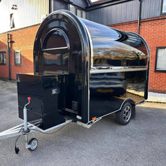 Black Compact Food Trailer with Curved Roof and Serving Window for Coffee, Drinks and Desserts