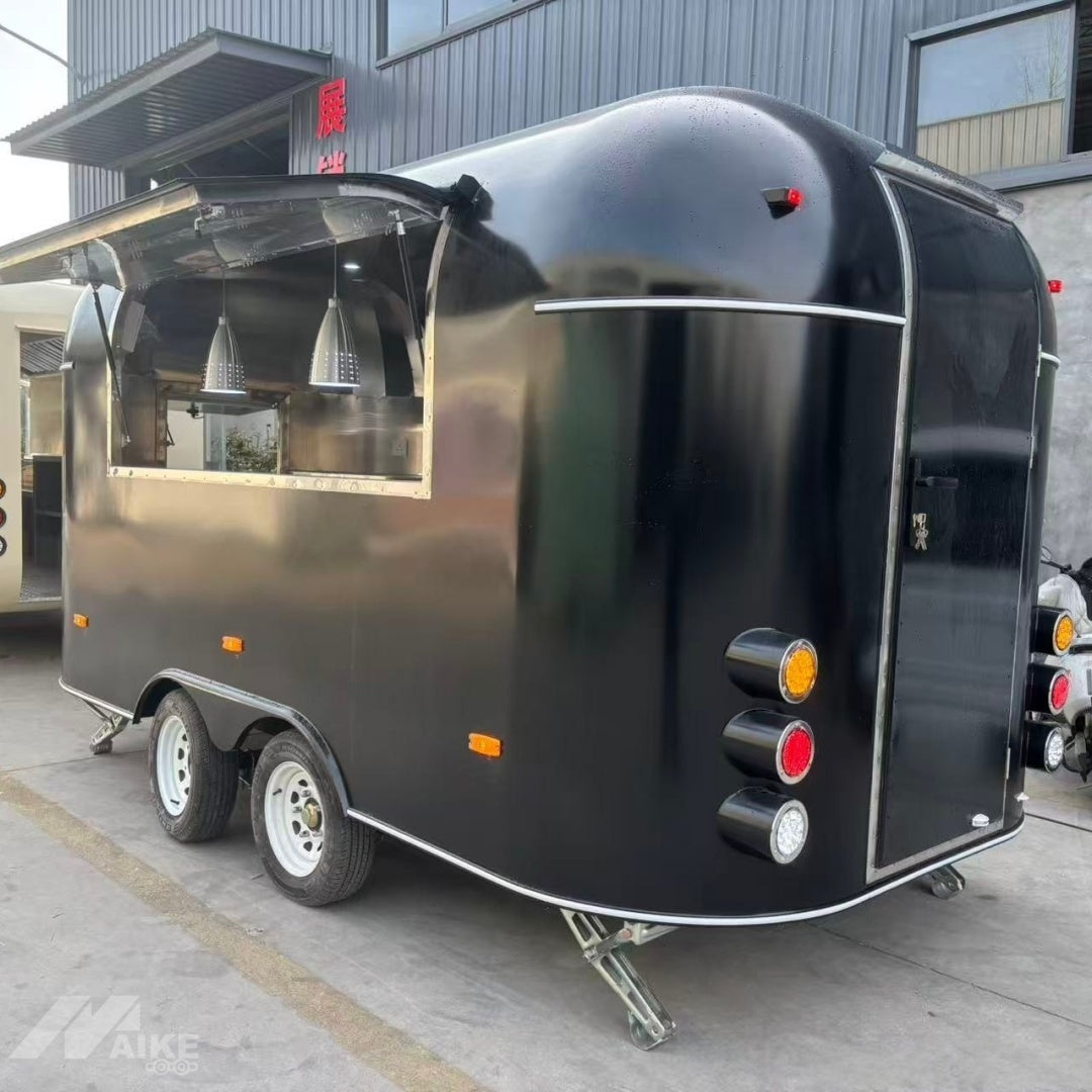 Sleek Black Capsule Food Trailer - Dual Axle Commercial Kitchen