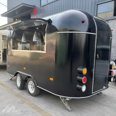 Sleek Black Capsule Food Trailer - Dual Axle Commercial Kitchen