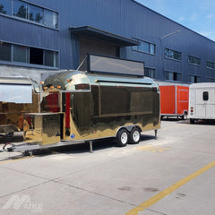 16.4ft Gold Streamline Food Trailer for VIP Event Catering with Mirror Stainless Finish & Rooftop Sign