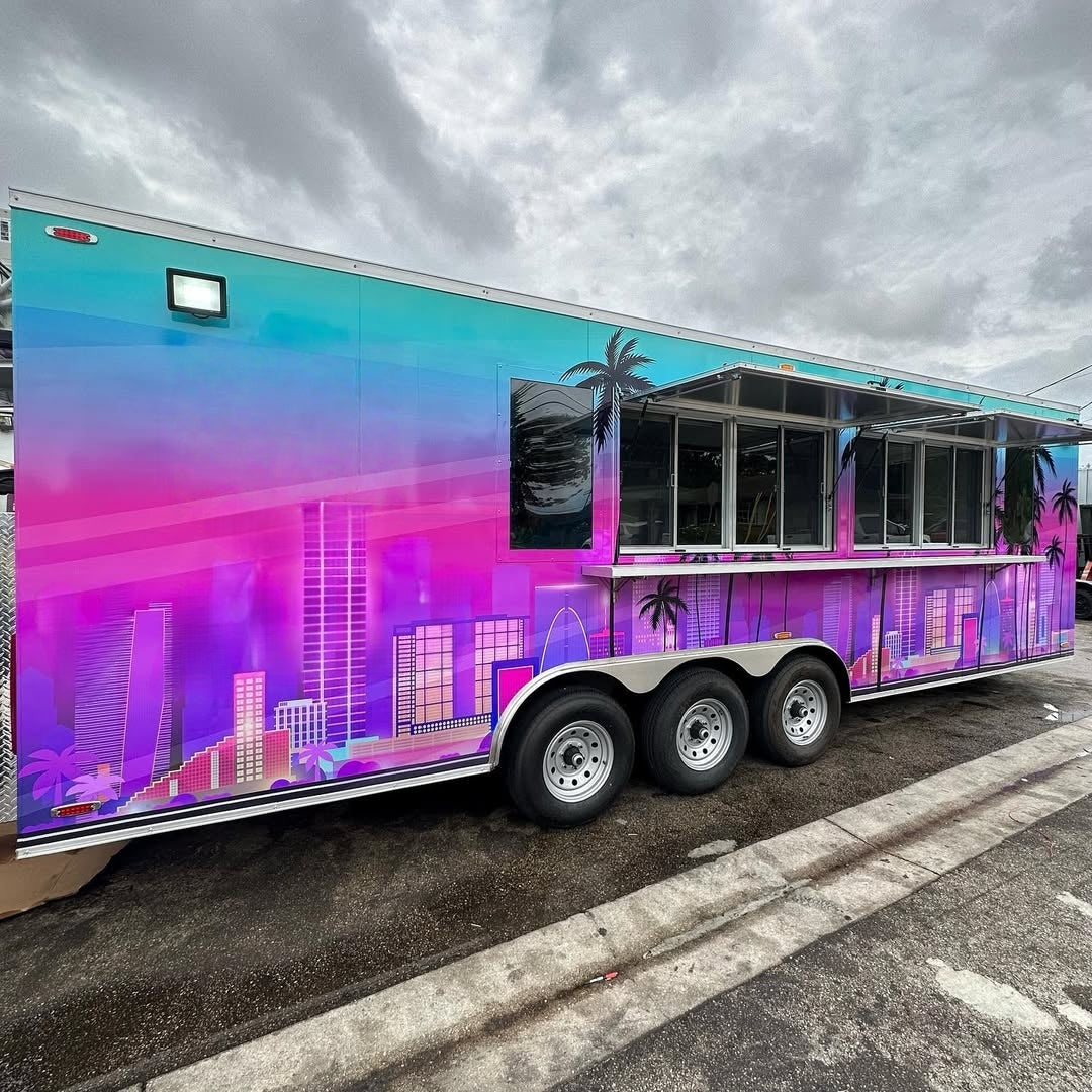 23ft Custom Wrapped Tri-Axle Enclosed Food Trailer for High-Volume Catering with Neon Skyline Design