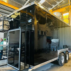 Glossy Black Enclosed Food Trailer with Stainless Counter - Dual Axle