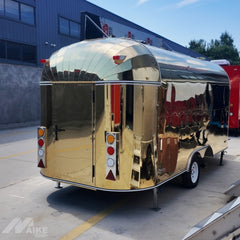 16.4ft Gold Streamline Food Trailer for VIP Event Catering with Mirror Stainless Finish & Rooftop Sign