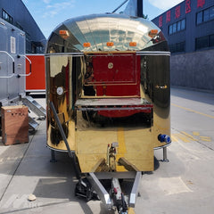 16.4ft Gold Streamline Food Trailer for VIP Event Catering with Mirror Stainless Finish & Rooftop Sign