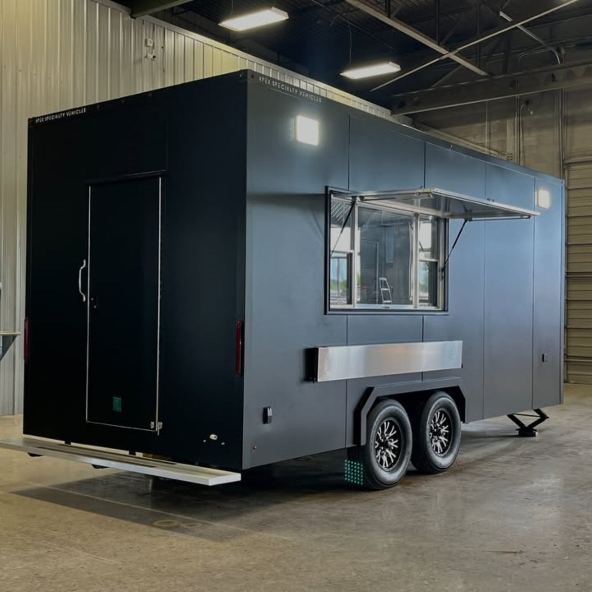 Sleek Matte Black Enclosed Food Trailer - Modern Dual Axle Kitchen