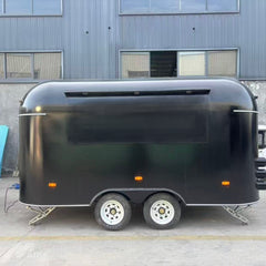 Sleek Black Capsule Food Trailer - Dual Axle Commercial Kitchen