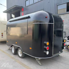 Sleek Black Capsule Food Trailer - Dual Axle Commercial Kitchen