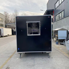 Sleek Black Enclosed Food Trailer - Dual Axle Commercial Kitchen