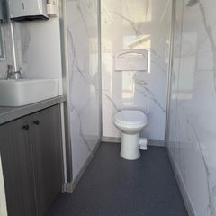 Modern Marble 2-Station Portable Restroom Trailer - Elegant Mobile Bathroom