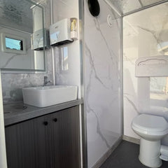 Modern Marble 2-Station Portable Restroom Trailer - Elegant Mobile Bathroom