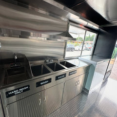 Black Food Truck with Fiery Flame Graphics & Gourmet Food Branding