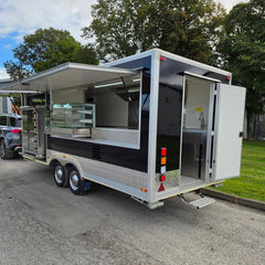 Black Double Axle Food Trailer with Rotisserie Oven, Glass Display Counter and Commercial Kitchen